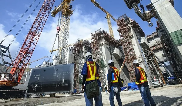 Current construction status of Purva Heritage in South Bangalore showing tower structure progress and site development at Judicial Layout.